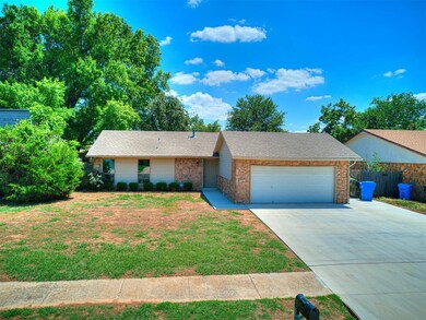 Single story home with a garage