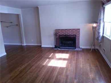 Living Room. Freshly painted, gleaming hardwood fl