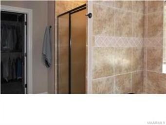 Large ceramic shower master shower has sealed grou