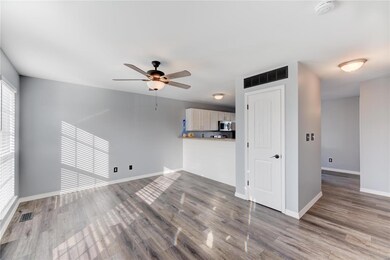 Living Room opens to Kitchen