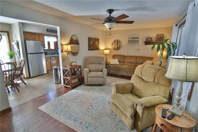 Spacious living room with laminate flooring