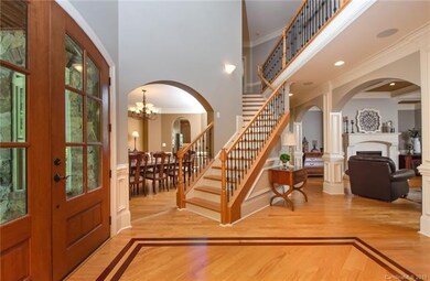 Foyer is flanked by the formal dining room and exe