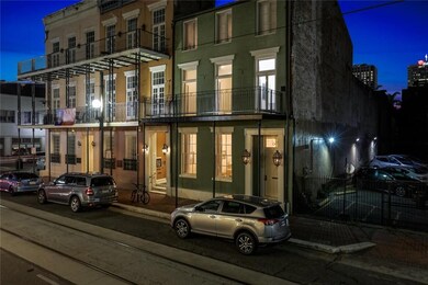 Twilight highlights the beautiful 3 story brick Ja