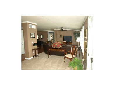 Family room overlooks private, lush back yard and 