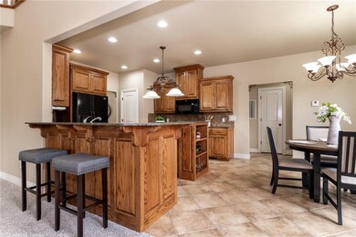Wide open kitchen with bar area