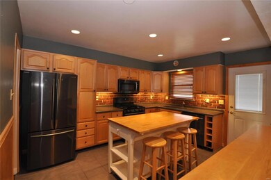 Custom cabinetry, w/moveable center island and bla