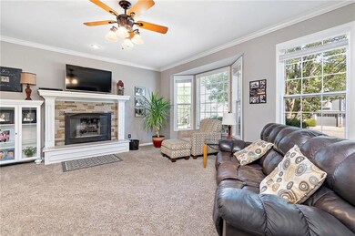 Bright and open living room with updated fireplace