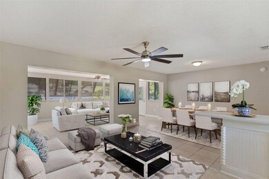 View of Living and Dining Rooms with View of Family Room