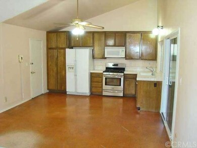 This is the HUGE country kitchen.  Notice the vaulted ceilings.  The owners had a dining room table in the middle and still plenty of room for a family room.  The slider leads out to a California room.