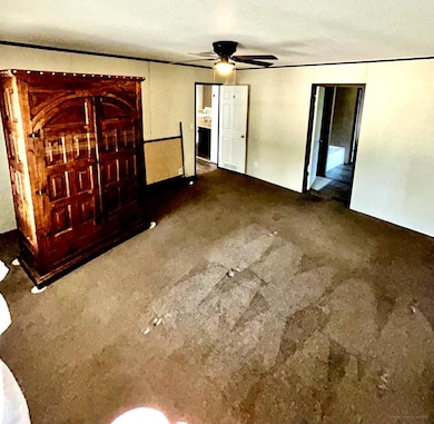 The spacious primary suite is calm, clean, and pri
