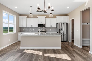 Photos are of a like(not exact) home in different location. Finishes may be different in actual home.