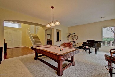 Living, dining room to entrance and stai
