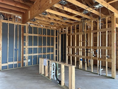 Misc room with concrete floors