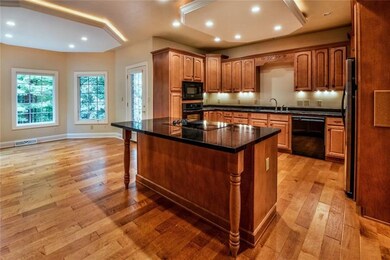 Brand new maple, hand-scraped flooring flows from 
