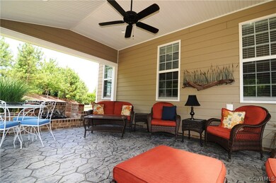 3 Season Covered Rear Porch has stamped concrete f