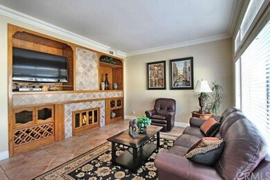 Family Room has Built Ins, Cozy fireplace, Crown M