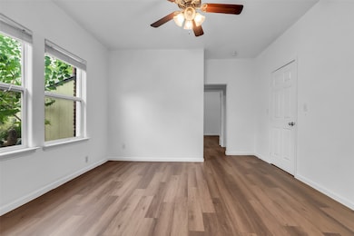 New floors and paint throughout the unit.