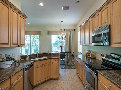 Lovley kitchen area with a million dollar view - golf course and water!