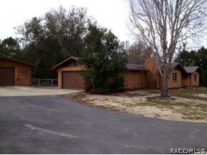 Left side w/garage & shed