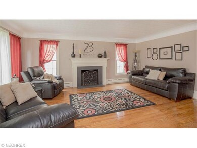 Living Room with Fireplace, Cove Ceiling, Hardwood