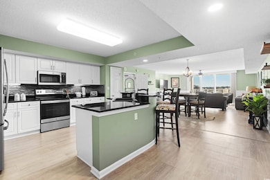 Kitchen with sink, stainless steel appliances, a k