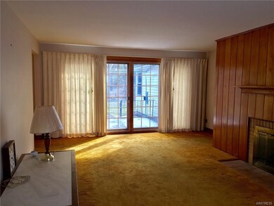 Large Living room with Pella Glass Sliding Doors t