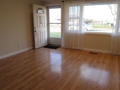 Front door entryway and living room.