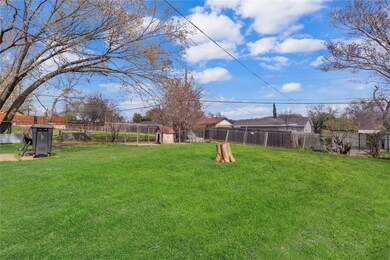 View of backyard from backdoor of home