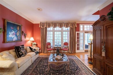 Living room with door to screened porch