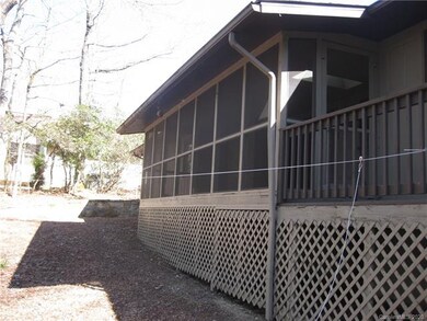 Large screened porch overlooks the golf course