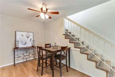 Dining room off kitchen; new ceiling fan and woo-l
