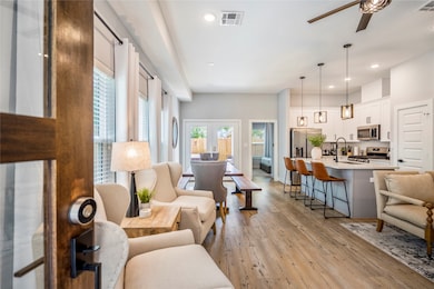 An open entry with an abundance of natural light and views straight to the backyard.