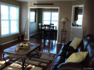 Living room with beautiful hardwood flooring!!!