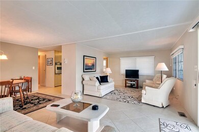 View of sitting area, living room, dining room and