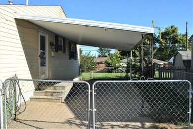 Fenced Carport
