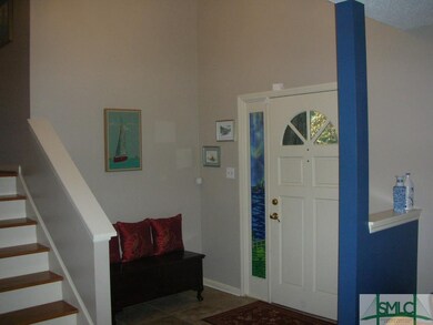 Cute nook just inside the front door lets you kick