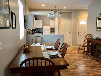 Open dining area leads to the kitchen.
