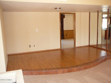 DINING AREA IS ELEVATED FROM LIVING ROOM