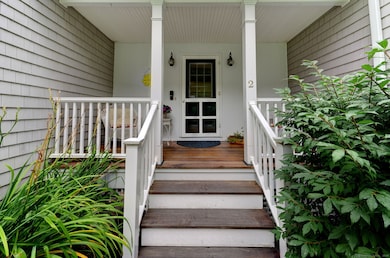 Lovely covered porch side entry way