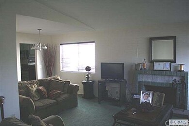 Step Down Living Room with Cozy Fireplace