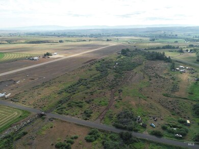 Aerial view of property's location with rural landscape