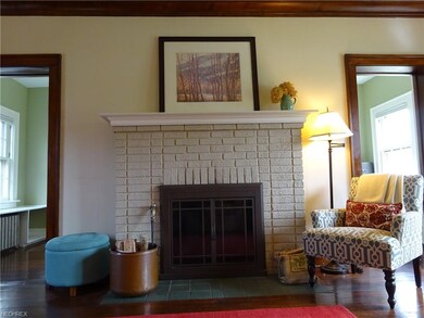 Attractive fireplace with tile hearth.