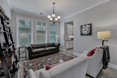 Another view of the formal dining room shows the wall of windows with upgraded window casing
