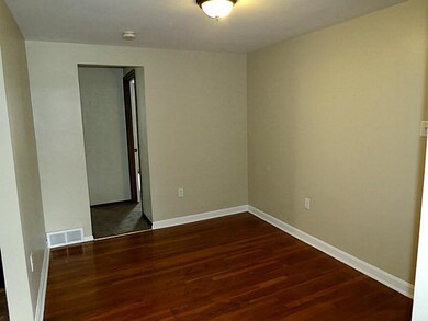 Dining Room. Beautiful hardwood floors accent the 