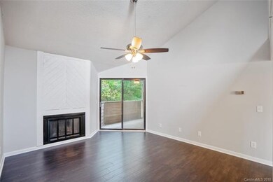 LIVING ROOM: This unit offers soaring vaulted ceil