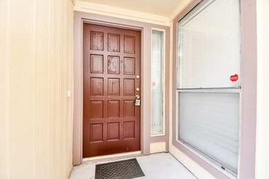 Step into comfort through this cozy covered entryw