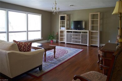 Spacious and bright living room!  Wood floors installed in 2013.