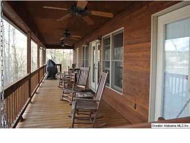 UPSTAIRS COVERED DECK WITH CEILING FANS