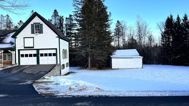 4. Additional garage with large lawn