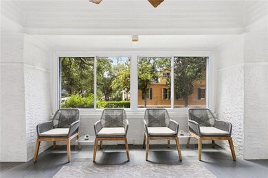 Enclosed sun porch overlooking Fern St.